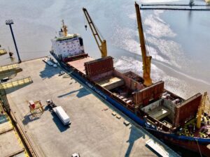 featured image showing the UTC Logistics crew moving cement plants