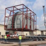 multimodal cement plant delivery - modular cement plant parts being transported via multimodal logistics solution