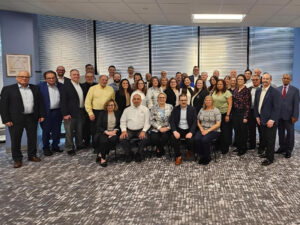 FEatured image showing the UTC Overseas Team at a Leadership Meeting.